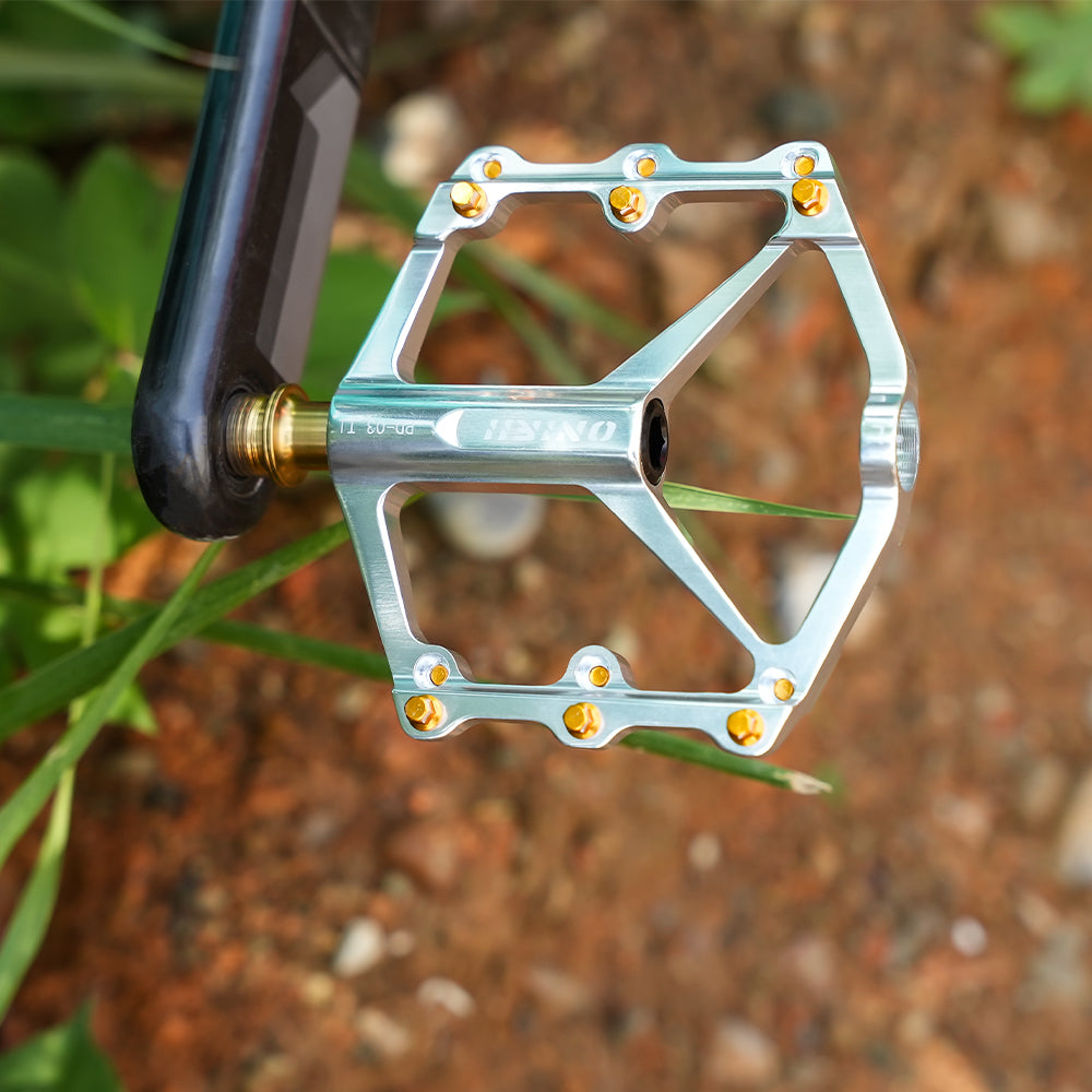 ONIRII PD-03 TI Ultralight Titanium Axle Flat Pedals with Triple Bearings Anti-Slip Pins for Road Folding and Mountain Bikes